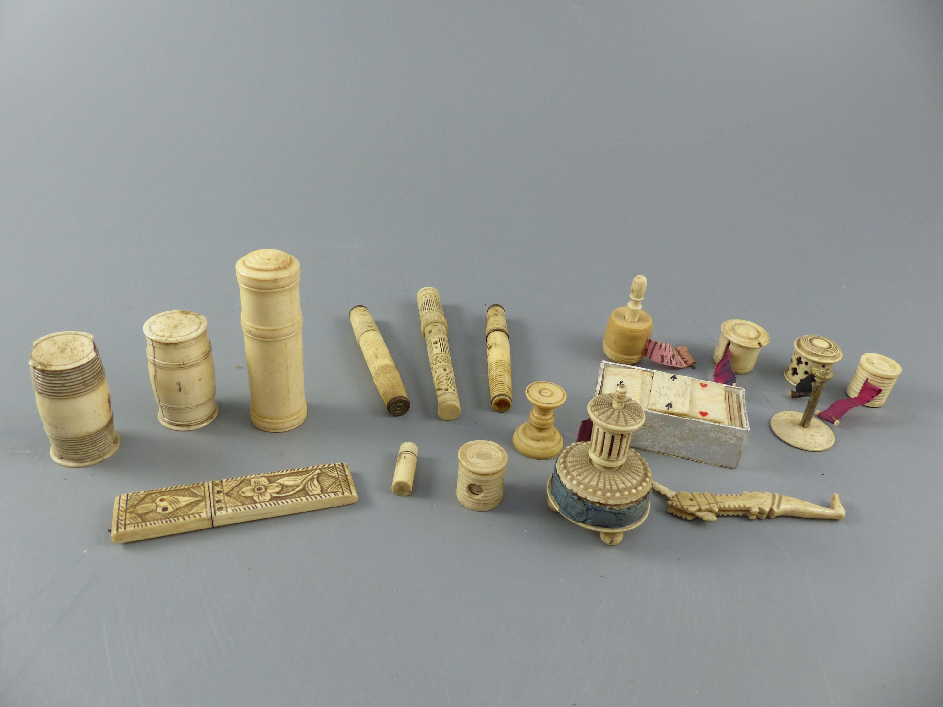 A collection of assorted 19th century bone sewing implements and objets dart
